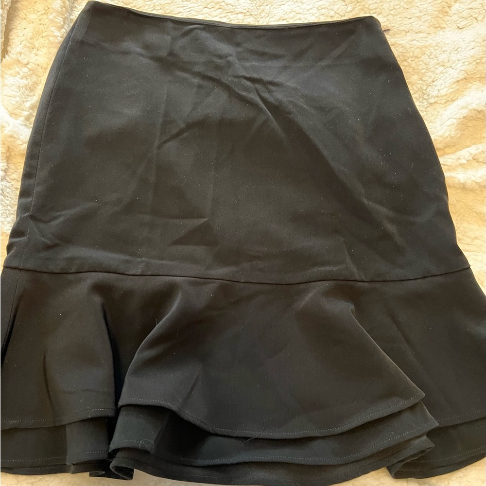 Women’s black dress skirt, ruffled bottom.  Size 0. White House Black Market.